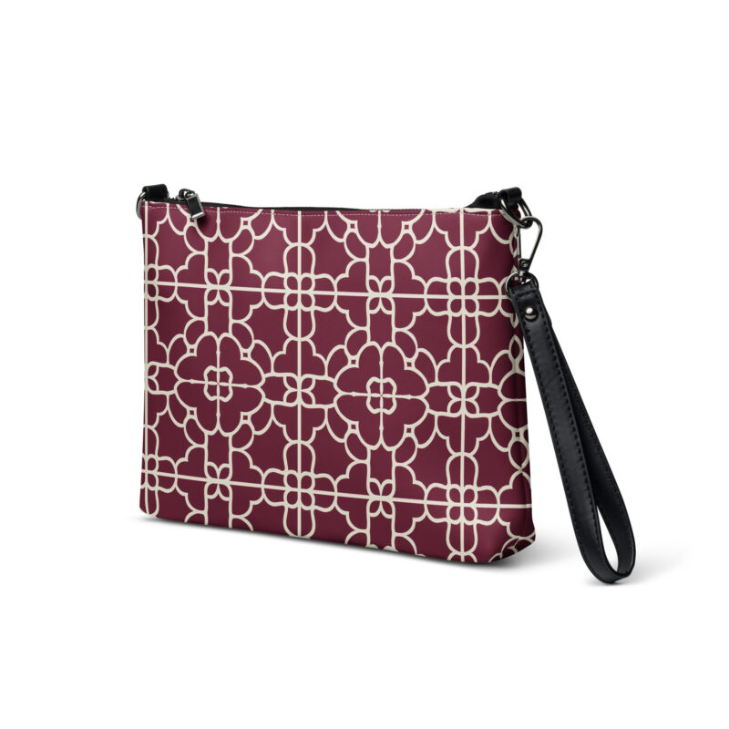 crossbody bag. A red bag with geometric patterns